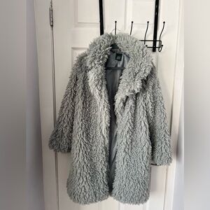 Mid length light gray blue collared jacket.